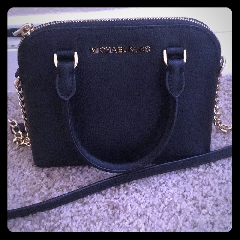 Micheal by Micheal kors small bag very cute